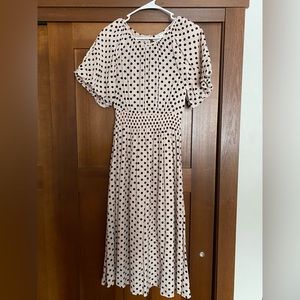 Pink polkadot midi dress with puffed sleeves